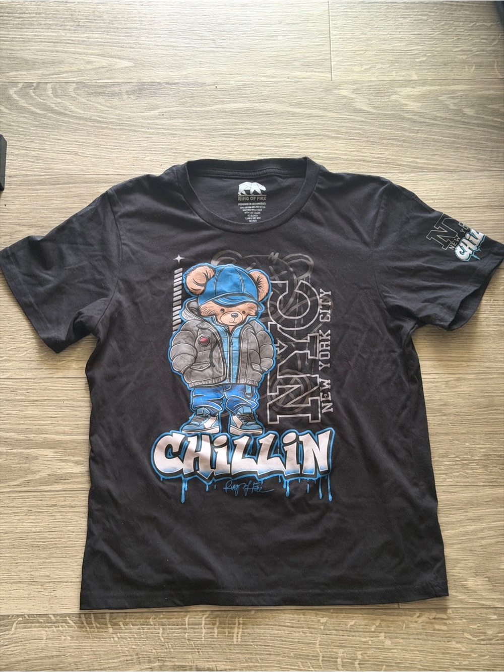 Ring of Fire Black Tee with Blue and Gray Graphic